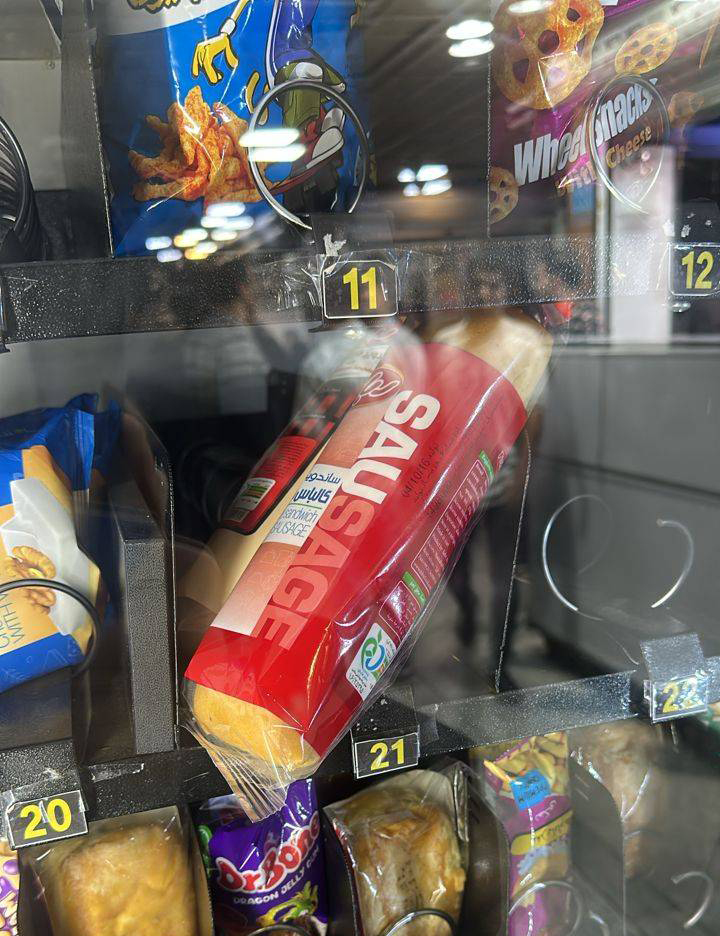 item stuck in snack vending machine